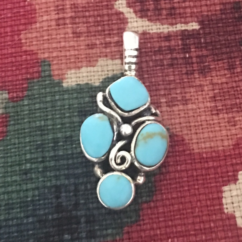 Turquoise & sterling silver pendant.